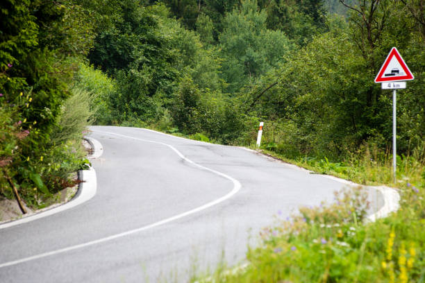 istock mountain country road in summer 678752030
