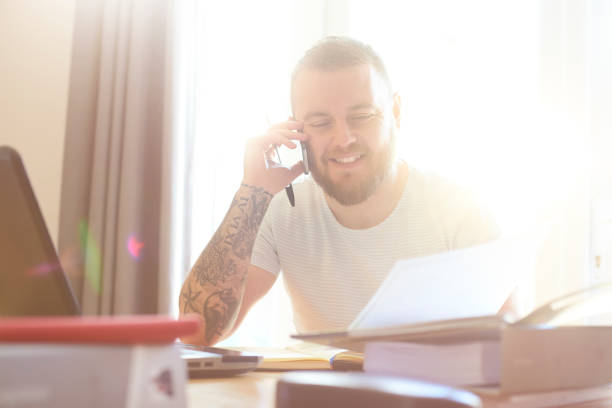 istock On the phone to his bank manager 678754102