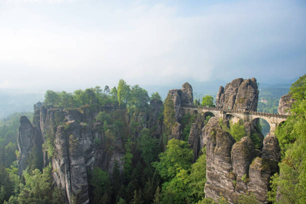 istock Bridge between rocks near Rathen, Germany, Europe (Sachsische Schweiz) 678754106
