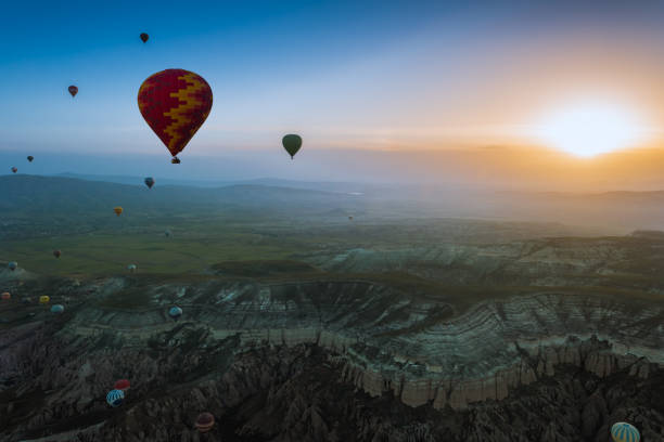 istock Hot air balloons flying over Cappadocia, Turkey 678754300
