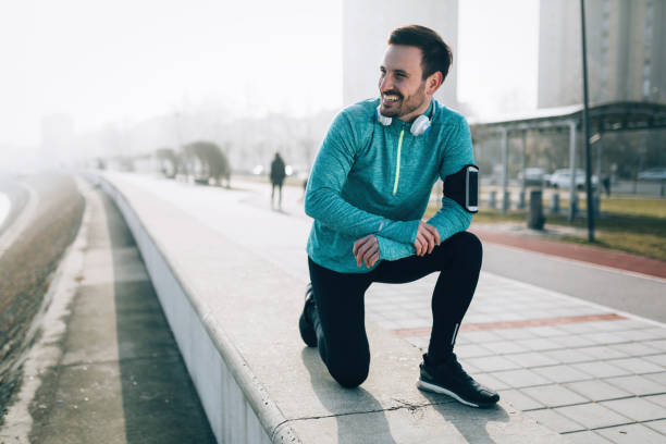 istock Active handsome sportsman training jogging and exercising outdoor 678755216