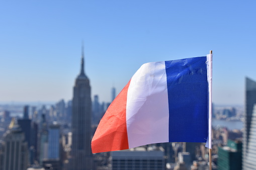 France flag against the background of Empire State Building
