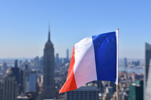 France flag against the background of Empire State Building