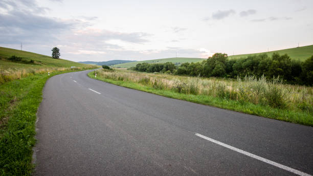 istock mountain country road in summer 678772004