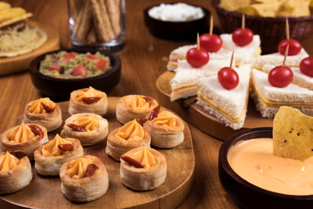 istock Game Day Snacks / Table with sandwiches and snacks 678780952