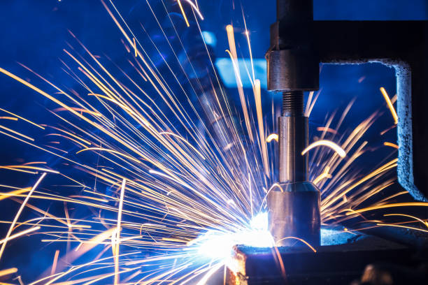 istock Welding robots movement in a car factory 678787278