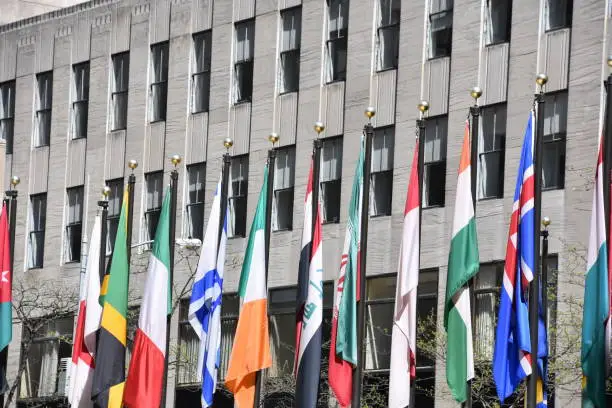 Skyscraper with world flags at the entrance