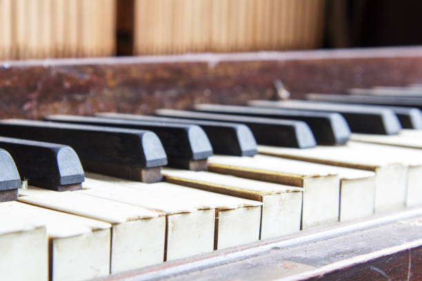 istock Keys from an old broken damaged piano 678795706