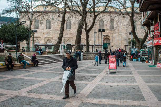 Bursa Grand Mosque or Ulu Cami Bursa, Turkey - February 04, 2017: People are visiting Bursa Grand Mosque or Ulu Cami which is a mosque in Bursa, Turkey ulu camii stock pictures, royalty-free photos & images