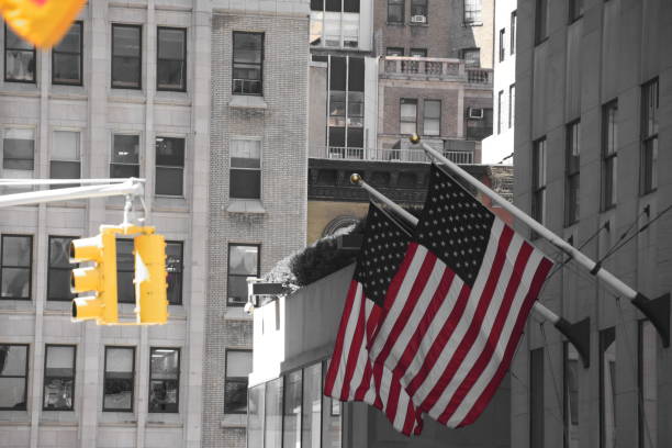 istock Skyscraper with US flag at the entrance 678795788