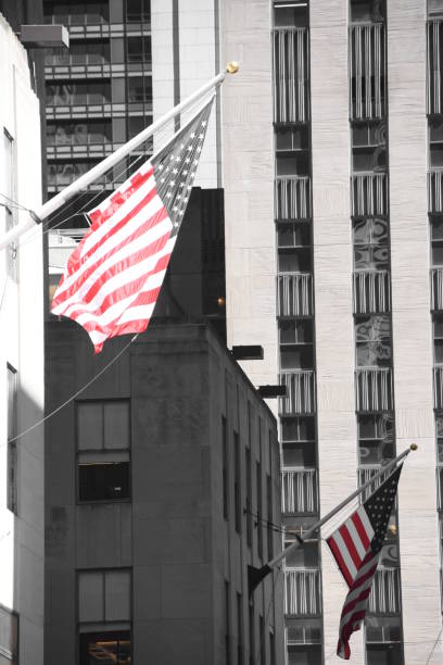 istock Skyscraper with US flag at the entrance 678795792
