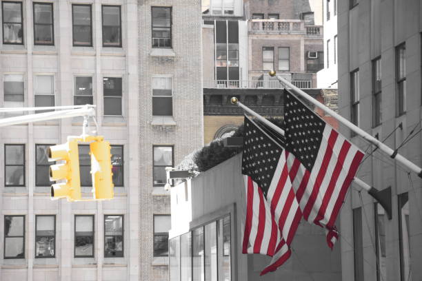 Skyscraper with US flag at the entrance