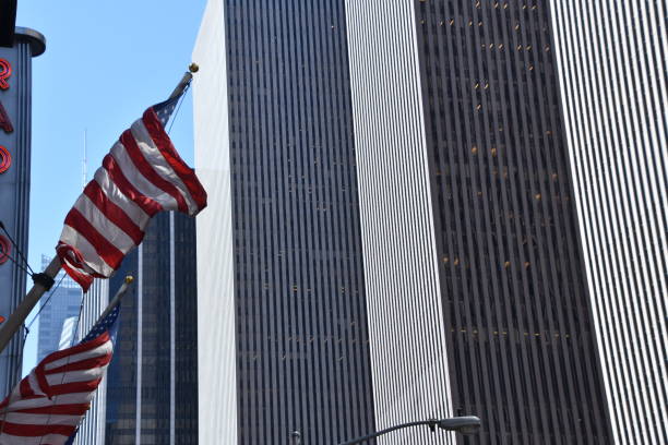istock Skyscraper with US flag at the entrance 678797862