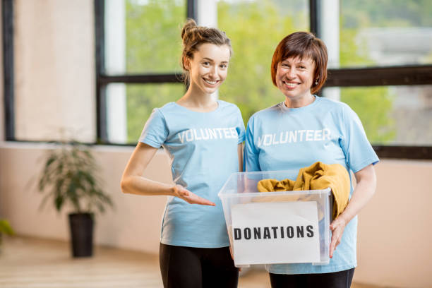 istock Volunteers with donation box 678799974