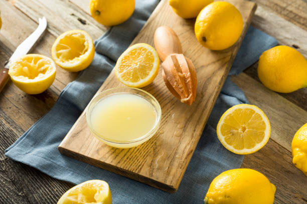 istock Raw Organic Yellow Lemon Juice 678829770
