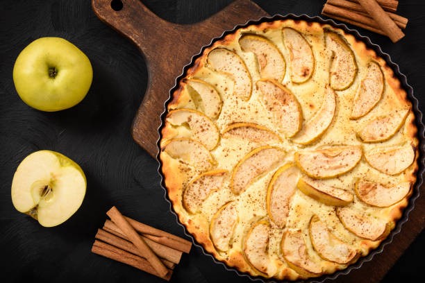 istock Homemade cheese pie with apples and cinnamon. 678830158