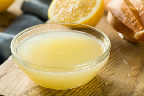 Raw Organic Yellow Lemon Juice stock photo