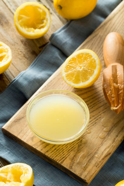 istock Raw Organic Yellow Lemon Juice 678831278