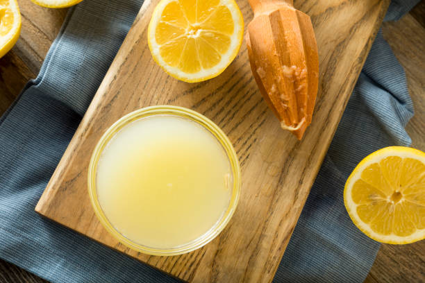 istock Raw Organic Yellow Lemon Juice 678835960