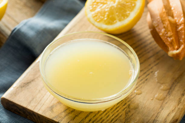 istock Raw Organic Yellow Lemon Juice 678836182