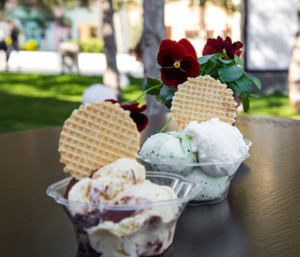 ice cream in cups and drink on the table