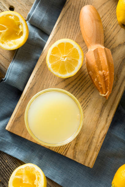 istock Raw Organic Yellow Lemon Juice 678836704