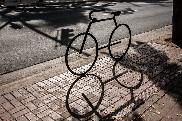 Top view of the bicycle parking lot. Yellow metal close-up with space for copying. High quality photo