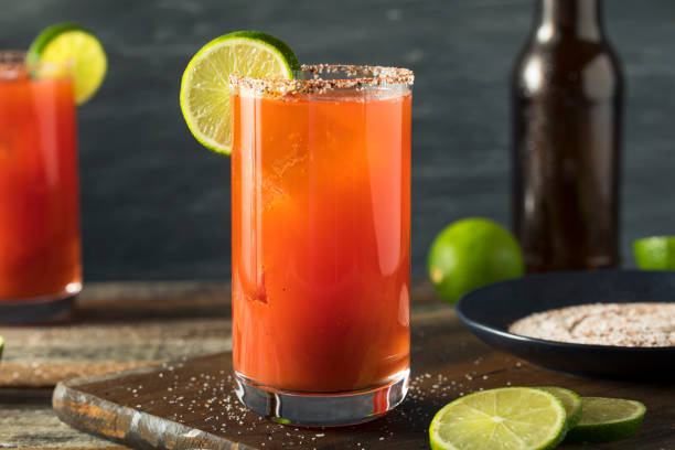 homemade michelada with beer and tomato juice - bloody mary imagens e fotografias de stock