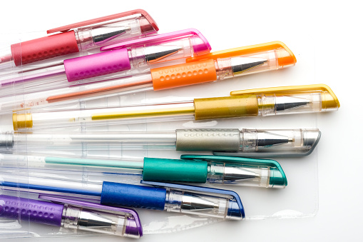 Photo of Colorful gel pen on white background