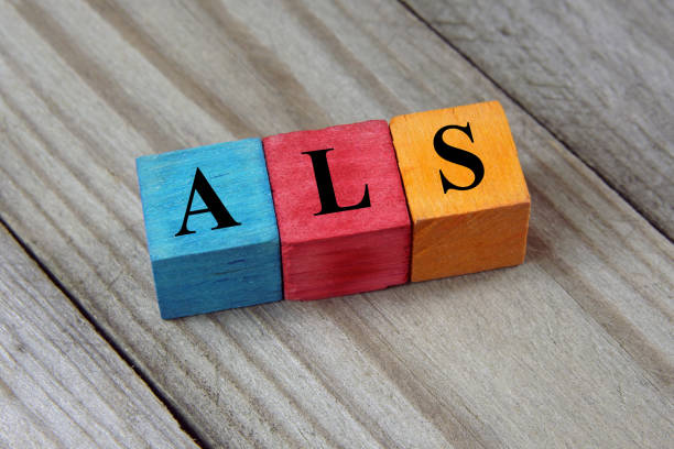 ALS acronym on colorful wooden cubes stock photo