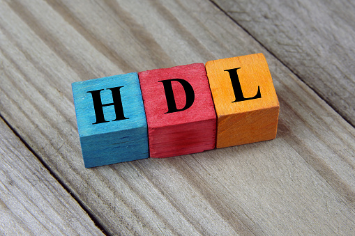 HDL (High-density lipoprotein) acronym on colorful wooden cubes