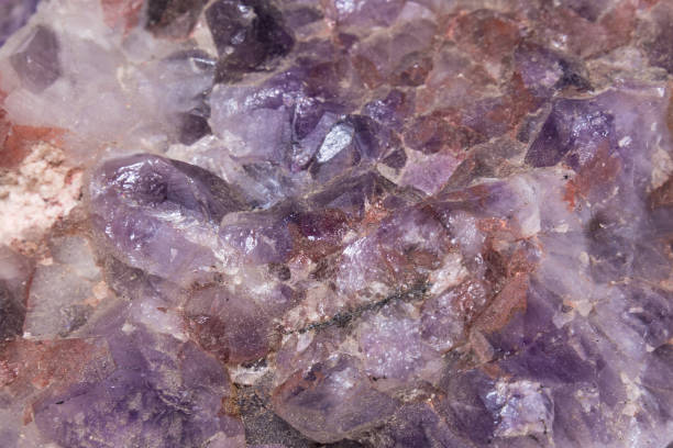 istock Purple gemstone gem jewel mineral precious stone caption 678859134