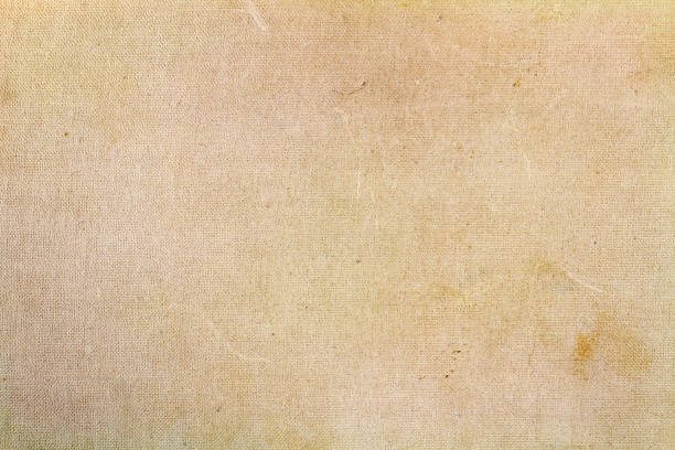istock Beige textile texture with dirty spots. Abstract background 678867388