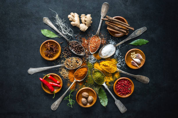 Various herbs and spices Various herbs and spices on black stone plate lime basil plant stock pictures, royalty-free photos & images