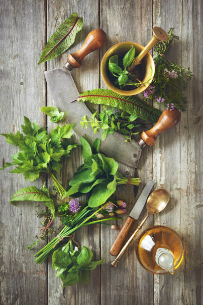 istock fresh herbs and spices on wooden table 678869928