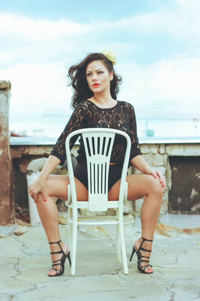 istock Beautiful, Sexy Ethnic Young Woman on Rooftop 678877434