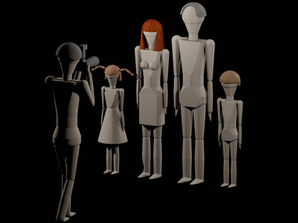 istock Photographer in studio while creating a family portrait 678882018