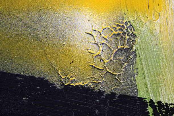 istock Relief forms on the wall. Yellow and black paint 678882704