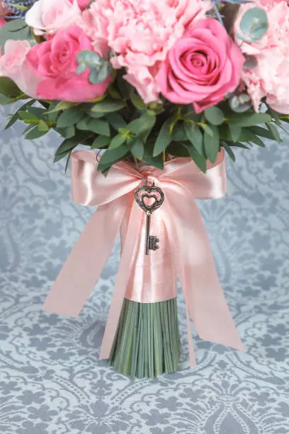 Closeup of a bridal bouquet handle wrap