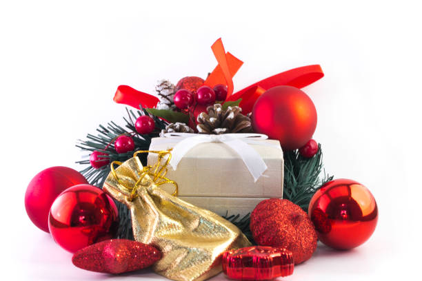 istock White gift box and golden with christmas decorations on white background 678917020
