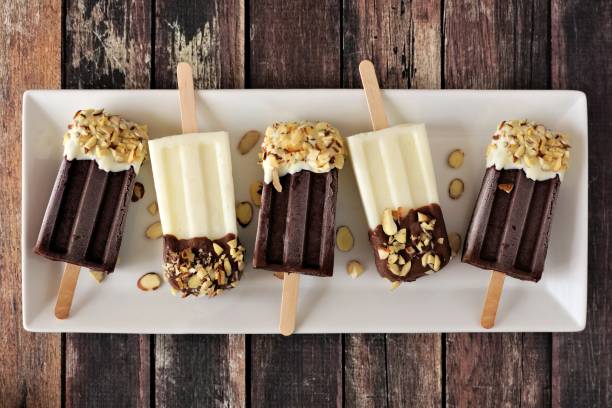 istock Chocolate and almond ice pops on a white plate 678933666