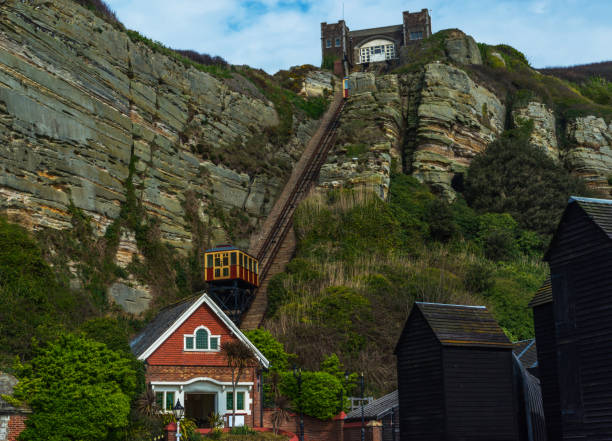 istock Cliff railway, funicular cable lift railway, in the seaside village, great rock blocks, 678934980