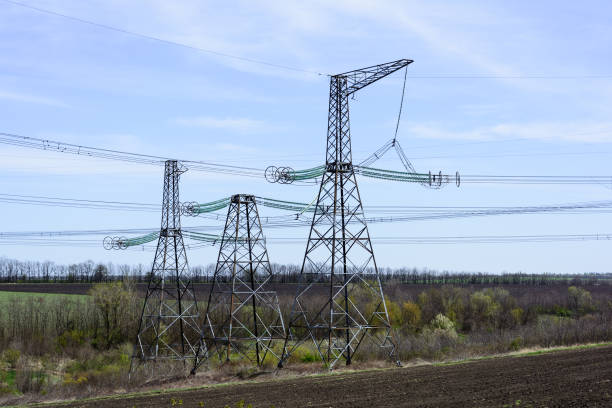 istock High-voltage power lines against the blue sky. 678935602