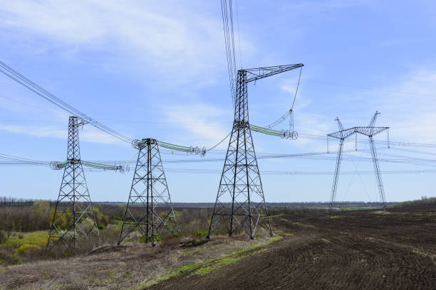 istock High-voltage power lines against the blue sky. 678935628