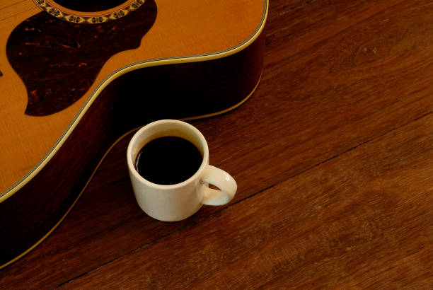 istock cup of coffee and acoustic guitar 678936192