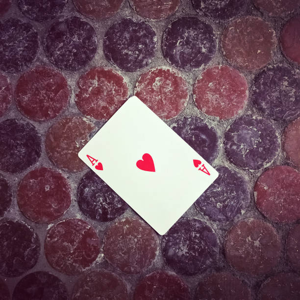 istock Ace of hearts card on the floor 678940254