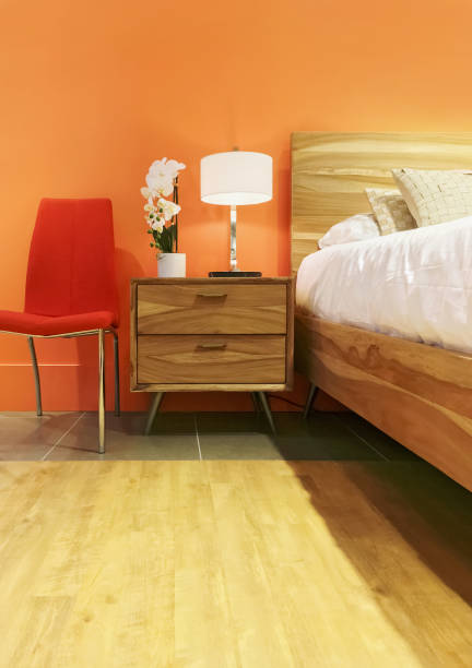 istock Bright bedroom in orange tones 678940402