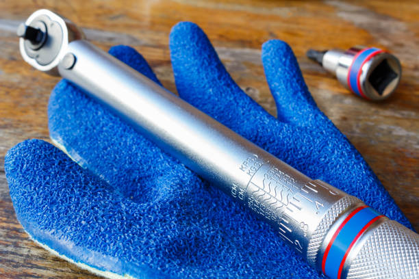 istock Torque wrench and work glove on the table in workshop 678940772