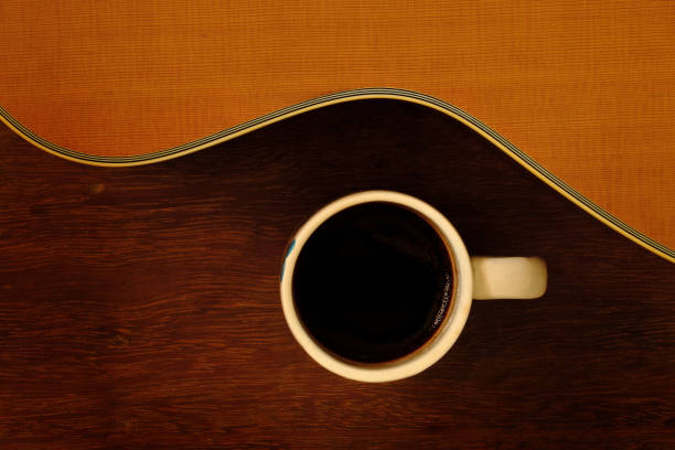 istock cup of coffee and acoustic guitar 678941308