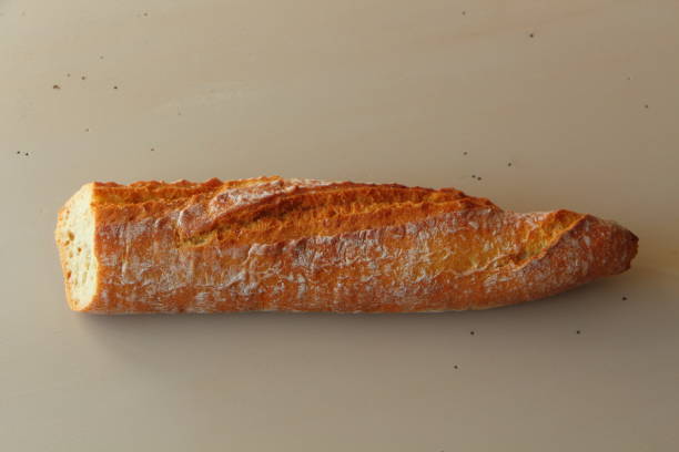istock Half French baguette of bread 678956216